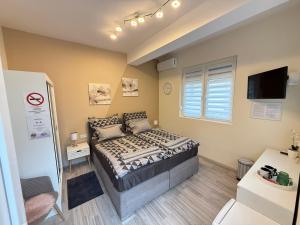 Postel nebo postele na pokoji v ubytování Málna 1