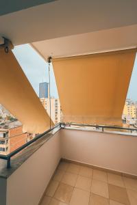 a balcony with a view of a city at Tirana Panorama in Tirana