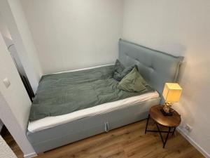 Ένα ή περισσότερα κρεβάτια σε δωμάτιο στο Ferienwohnung Neuwied