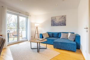 Χώρος καθιστικού στο Haus Dippel am Kurpark inklusive Chiemgaukarte