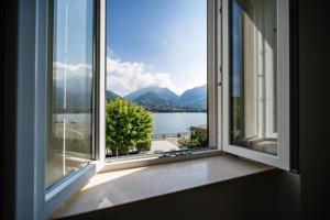 Galería fotográfica de Renzo & Lucia Lakefront Suites with Stunning Views of Lake Como en Malgrate 29 fotos más