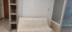 a white closet with a white bench in it at RelaxMza in Mendoza +4 photos