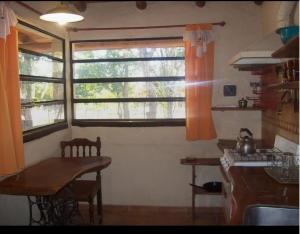 Kuchyň nebo kuchyňský kout v ubytování La Chakana