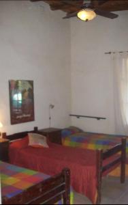 Postel nebo postele na pokoji v ubytování La Chakana