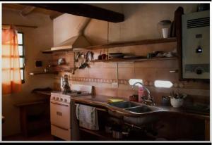 Kuchyň nebo kuchyňský kout v ubytování La Chakana + 1 fotografie