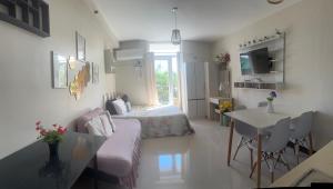 Televiisor ja/või meelelahutuskeskus majutusasutuses Saekyung 956 Condominium Studio Type