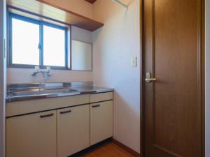 Køkken eller tekøkken på Misaki Guesthouse - Vacation STAY 20495 + 71 billeder