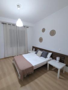 Ένα ή περισσότερα κρεβάτια σε δωμάτιο στο Casa Los Tilos 2