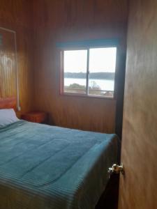 Ένα ή περισσότερα κρεβάτια σε δωμάτιο στο Pudu 2