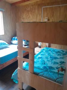 Ένα ή περισσότερα κρεβάτια σε δωμάτιο στο Pudu 2