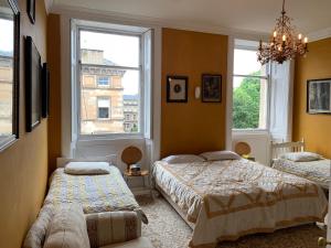 Ένα ή περισσότερα κρεβάτια σε δωμάτιο στο 2 Chester St