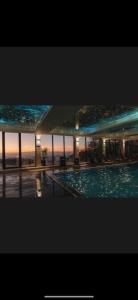 a view of a swimming pool in a building at N-LUX 66 MILMARI kopaonik in Kopaonik