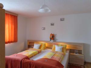 Ένα ή περισσότερα κρεβάτια σε δωμάτιο στο Appartements Martha