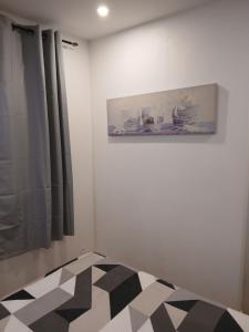 Postel nebo postele na pokoji v ubytování vacances au soleil