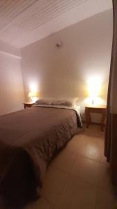 Postel nebo postele na pokoji v ubytování Ayres de Giulias + 19 fotografií