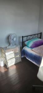 Ένα ή περισσότερα κρεβάτια σε δωμάτιο στο Private room on upper floor