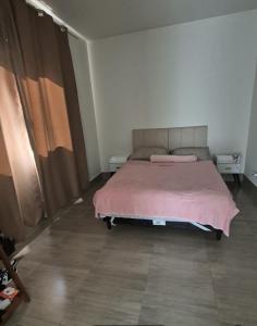 Postel nebo postele na pokoji v ubytování Casa de praia Policarpo