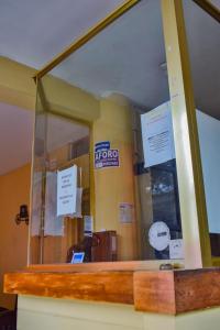 a mirror on the wall of a store at Hotel La Quinta de Allison in Lima +3 photos