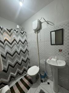 Ванная комната в Apartamento em Macaé