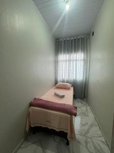 Кровать или кровати в номере Apartamento em Macaé