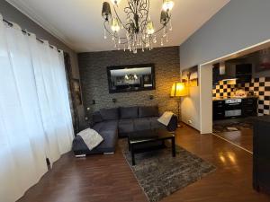 TV a/nebo společenská místnost v ubytování Be-Ta Apartament