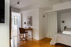 Ένα ή περισσότερα κρεβάτια σε δωμάτιο στο Cozy & Bright Studio Apartment in Lidingö +7 φωτογραφίες