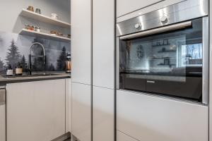 Kuchyň nebo kuchyňský kout v ubytování Relax Homedesign gemütliche Wohnung im Grünen in der Nähe von HH