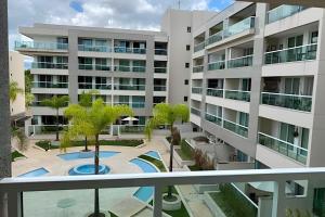 a view from the balcony of an apartment building at Brisas do Lago - Apartamentos in Brasilia