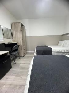 Ένα ή περισσότερα κρεβάτια σε δωμάτιο στο Plaza London Hotel