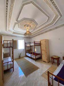 Postel nebo postele na pokoji v ubytování Dania Surf Appartement