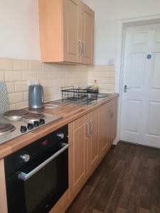 Kuchyň nebo kuchyňský kout v ubytování Contractor rooms