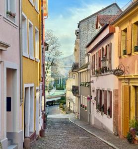 an empty street in a town with buildings at Hotel Bischoff in Baden-Baden