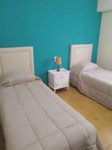 Postel nebo postele na pokoji v ubytování Hosteria + 10 fotografií