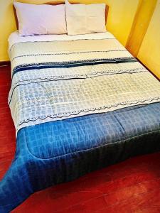 Postel nebo postele na pokoji v ubytování AUSANGATE LODGE 7 Lagunas