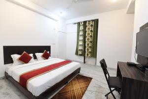 Ένα ή περισσότερα κρεβάτια σε δωμάτιο στο OOAK Knowledge Park