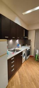 Η κουζίνα ή μικρή κουζίνα στο Little Park