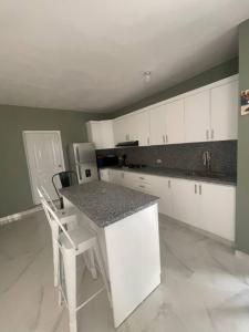 Kuchyň nebo kuchyňský kout v ubytování Desconecta para volver a conectar