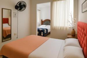 Giường trong phòng chung tại come to me