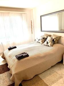 Ένα ή περισσότερα κρεβάτια σε δωμάτιο στο Ferienwohnung Gian