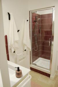 Koupelna v ubytování Jolie maison ancienne + 16 fotografií