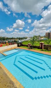 Πισίνα στο ή κοντά στο Paz Home's Kiambu Road