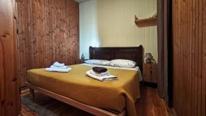 En eller flere senge i et værelse på Villa Tancredi - Le Refuge