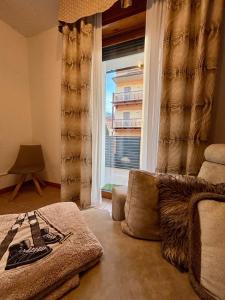 Et opholdsområde på Villa Serena - appartamento a Primiero San Martino di Castrozza