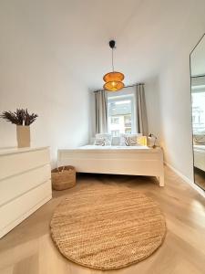 Postel nebo postele na pokoji v ubytování Helle Altbauperle zwischen Köln & Düsseldorf