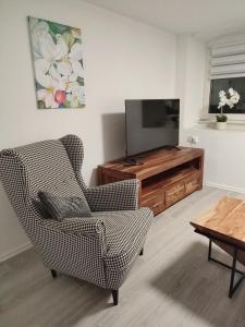 TV a/nebo společenská místnost v ubytování Südeifel Spangdahlem + 8 fotografií