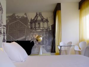 Posteľ alebo postele v izbe v ubytovaní Hotel Ripa Roma