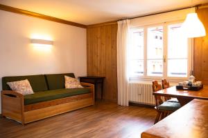 Χώρος καθιστικού στο Comodo appartamento a San Vito di Cadore