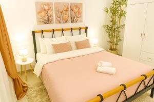 Ένα ή περισσότερα κρεβάτια σε δωμάτιο στο Belvedere Luxury Suite