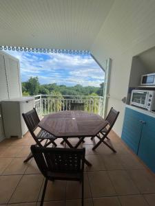 Kuchyň nebo kuchyňský kout v ubytování Appart T2 les Saintes 34 Pierre et Vacances