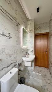 Ένα μπάνιο στο Résidence Yvette cocody Rivièra N'badon